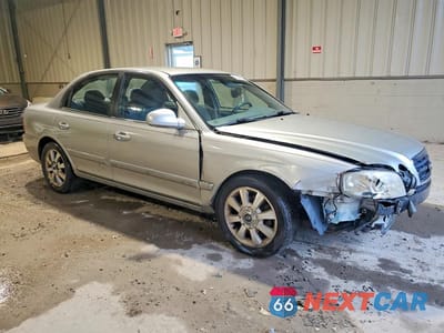 Czwarte zdjęcie samochodu z boku: 2006 KIA OPTIMA LX V6 VIN:KNAGD128565438825 - miniatura