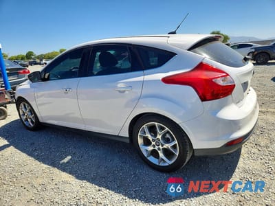 Drugie zdjęcie samochodu z przodu: 2014 FORD FOCUS TITANIUM VIN:1FADP3N21EL281729 - miniatura