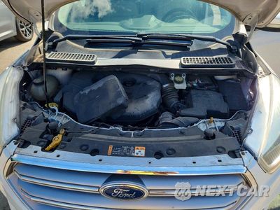 Zdjęcie 12 z 13 samochodu: 2017 FORD ESCAPE TITANIUM VIN:1FMCU9J98HUE21600 - miniatura