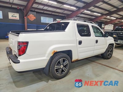 Trzecie zdjęcie samochodu z tyłu: 2014 HONDA RIDGELINE SPORT VIN:5FPYK1F77EB009706 - miniatura