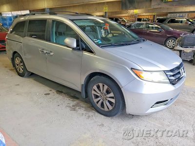 Czwarte zdjęcie samochodu z boku: 2014 HONDA ODYSSEY EXL VIN:5FNRL5H63EB018909 - miniatura