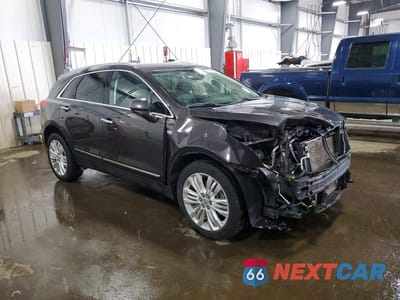 Czwarte zdjęcie samochodu z boku: 2019 CADILLAC XT5 PREMIUM LUXURY VIN:1GYKNFRS0KZ155058 - miniatura
