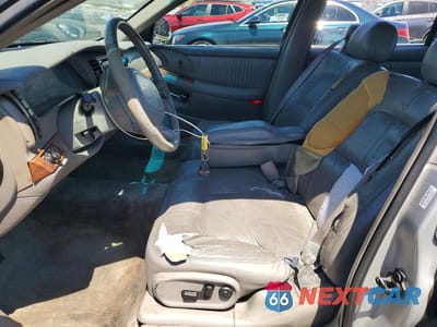 Zdjęcie 7 z 12 samochodu: 2000 BUICK PARK AVENUE VIN:1G4CW52K6Y4111725 - miniatura