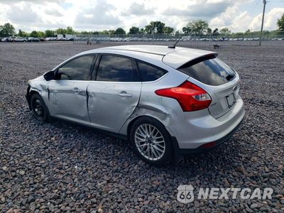 Drugie zdjęcie samochodu z przodu: 2014 FORD FOCUS TITANIUM VIN:1FADP3N27EL463404 - miniatura