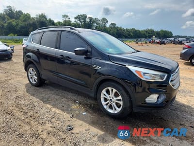 Czwarte zdjęcie samochodu z boku: 2018 FORD ESCAPE SE VIN:1FMCU0GD7JUD18455 - miniatura