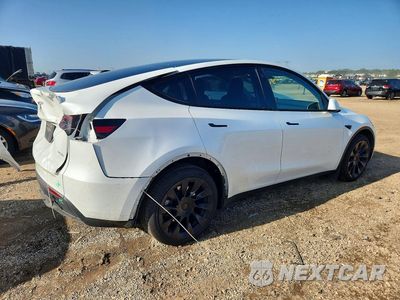 Trzecie zdjęcie samochodu z tyłu: 2023 TESLA MODEL Y VIN:7SAYGDEE9PA082753 - miniatura