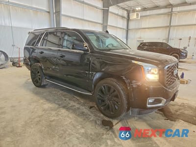 Czwarte zdjęcie samochodu z boku: 2019 GMC YUKON SLT VIN:1GKS2BKC5KR165437 - miniatura