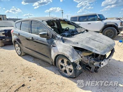 Czwarte zdjęcie samochodu z boku: 2014 FORD ESCAPE SE VIN:1FMCU0GX1EUD57848 - miniatura