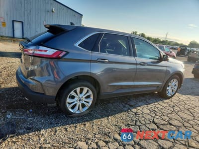 Trzecie zdjęcie samochodu z tyłu: 2022 FORD EDGE TITANIUM VIN:2FMPK4K92NBA55708 - miniatura