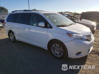 Czwarte zdjęcie samochodu z boku: 2014 TOYOTA SIENNA XLE 8-PASSENGER VIN:5TDYK3DC7ES448114 - miniatura