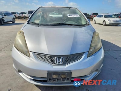 Piąte zdjęcie samochodu w środku: 2012 HONDA FIT VIN:JHMGE8H3XCC040813 - miniatura