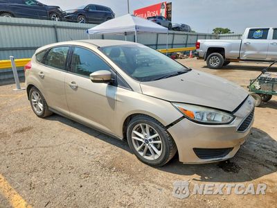 Czwarte zdjęcie samochodu z boku: 2017 FORD FOCUS SE VIN:1FADP3K24HL217113 - miniatura