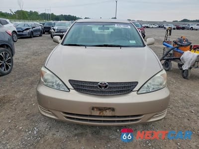 Piąte zdjęcie samochodu w środku: 2003 TOYOTA CAMRY LE VIN:4T1BE32K93U727298 - miniatura
