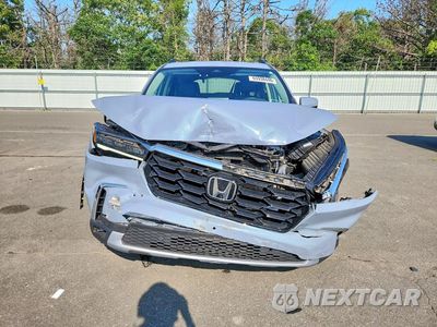 Piąte zdjęcie samochodu w środku: 2025 HONDA PILOT TOURING VIN:5FNYG1H72SB056144 - miniatura