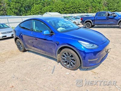Czwarte zdjęcie samochodu z boku: 2022 TESLA MODEL Y VIN:7SAYGDEE9NA009363 - miniatura