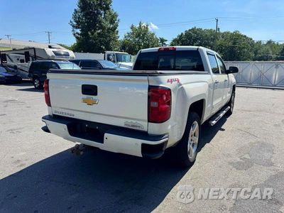 Trzecie zdjęcie samochodu z tyłu: 2014 CHEVROLET SILVERADO K1500 HIGH COUNTRY VIN:3GCUKTEC4EG386442 - miniatura