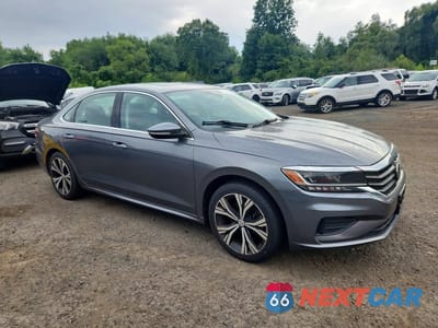Czwarte zdjęcie samochodu z boku: 2021 VOLKSWAGEN PASSAT SE VIN:1VWSA7A36MC003137 - miniatura
