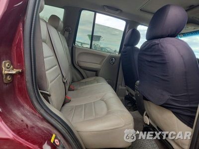 Zdjęcie 10 z 13 samochodu: 2003 JEEP LIBERTY LIMITED VIN:1J8GL58K43W558582 - miniatura