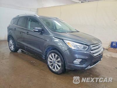 Czwarte zdjęcie samochodu z boku: 2018 FORD ESCAPE TITANIUM VIN:1FMCU9J99JUA21194 - miniatura
