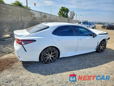 Trzecie zdjęcie samochodu z tyłu: 2024 TOYOTA CAMRY HYBRID SE VIN:4T1S31AK6RU623209 - miniatura