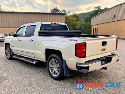Trzecie zdjęcie samochodu z tyłu: 2014 CHEVROLET SILVERADO K1500 HIGH COUNTRY VIN:3GCUKTEC9EG328410 - miniatura