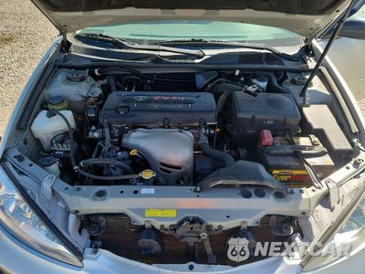 Zdjęcie 11 z 12 samochodu: 2004 TOYOTA CAMRY LE VIN:4T1BE32K94U899705 - miniatura