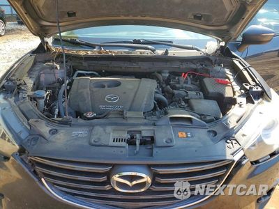 Zdjęcie 12 z 13 samochodu: 2016 MAZDA CX-5 TOURING VIN:JM3KE2CYXG0613039 - miniatura