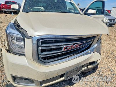 Zdjęcie 12 z 13 samochodu: 2015 GMC YUKON XL K1500 SLT VIN:1GKS2HKC7FR647612 - miniatura