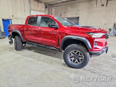 Czwarte zdjęcie samochodu z boku: 2024 CHEVROLET COLORADO ZR2 VIN:1GCPTFEKXR1143483 - miniatura