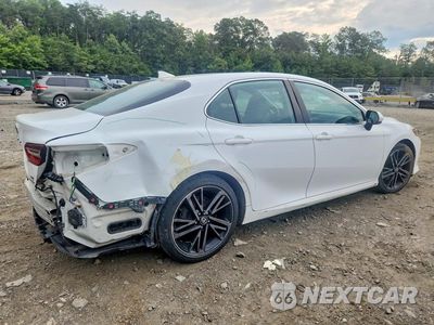 Trzecie zdjęcie samochodu z tyłu: 2022 TOYOTA CAMRY LE VIN:4T1H31AK6NU576509 - miniatura