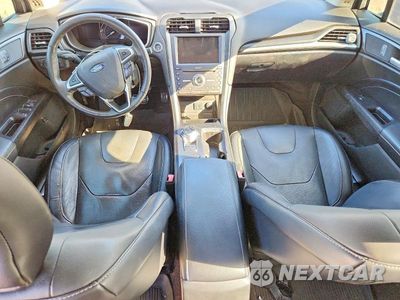 Zdjęcie 8 z 12 samochodu: 2017 FORD FUSION TITANIUM PHEV VIN:3FA6P0SU6HR180673 - miniatura