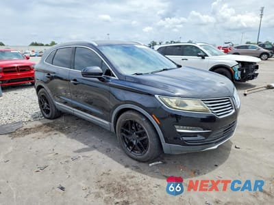Czwarte zdjęcie samochodu z boku: 2015 LINCOLN MKC VIN:5LMCJ1A94FUJ45338 - miniatura