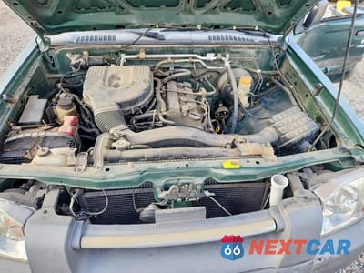 Zdjęcie 11 z 12 samochodu: 2002 NISSAN FRONTIER STANDARD VIN:1N6DD26S72C325740 - miniatura