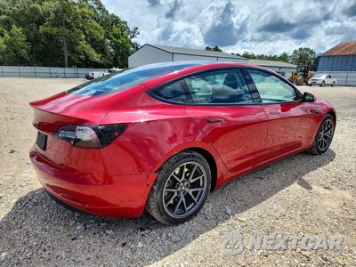 Trzecie zdjęcie samochodu z tyłu: 2022 TESLA MODEL 3 VIN:5YJ3E1EA9NF187639 - miniatura