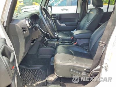 Zdjęcie 7 z 12 samochodu: 2015 JEEP WRANGLER UNLIMITED SAHARA VIN:1C4BJWEG7FL503529 - miniatura