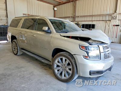 Czwarte zdjęcie samochodu z boku: 2016 CHEVROLET SUBURBAN C1500 LT VIN:1GNSCHKC5GR412384 - miniatura