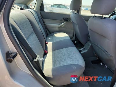 Zdjęcie 10 z 12 samochodu: 2005 FORD FOCUS ZX4 VIN:1FAFP34N35W304415 - miniatura