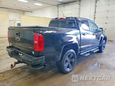 Trzecie zdjęcie samochodu z tyłu: 2018 CHEVROLET COLORADO LT VIN:1GCGTCEN7J1171075 - miniatura