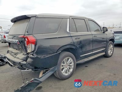 Trzecie zdjęcie samochodu z tyłu: 2022 GMC YUKON SLT VIN:1GKS1BKD6NR321386 - miniatura