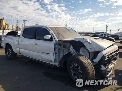 Czwarte zdjęcie samochodu z boku: 2017 TOYOTA TACOMA TRD SPORT VIN:3TMDZ5BN0HM022490 - miniatura