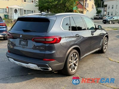 Trzecie zdjęcie samochodu z tyłu: 2021 BMW X5 XDRIVE45E VIN:5UXTA6C00M9F01336 - miniatura