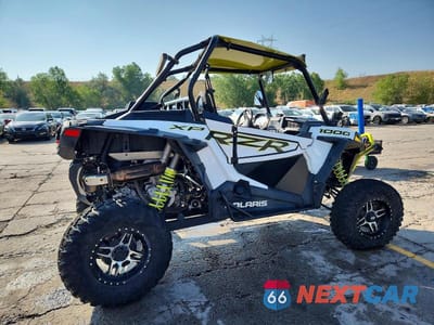Czwarte zdjęcie samochodu z boku: 2021 POLARIS RZR 1000 XP UTILITY VEHICLE VIN:3NSNAE995MF141251 - miniatura