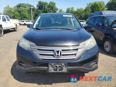 Piąte zdjęcie samochodu w środku: 2014 HONDA CR-V LX VIN:2HKRM4H39EH727603 - miniatura