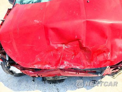 Zdjęcie 11 z 13 samochodu: 2009 FORD FOCUS SES VIN:1FAHP36N99W185832 - miniatura
