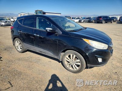 Czwarte zdjęcie samochodu z boku: 2010 HYUNDAI TUCSON LIMITED VIN:KM8JUCAC3AU024334 - miniatura