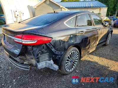 Trzecie zdjęcie samochodu z tyłu: 2017 FORD FUSION SE VIN:3FA6P0T91HR185340 - miniatura