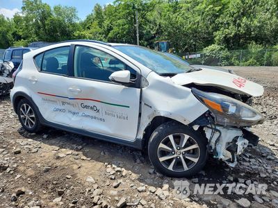 Czwarte zdjęcie samochodu z boku: 2018 TOYOTA PRIUS C TWO VIN:JTDKDTB31J1599833 - miniatura