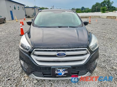 Piąte zdjęcie samochodu w środku: 2017 FORD ESCAPE SE VIN:1FMCU9GD7HUD28868 - miniatura