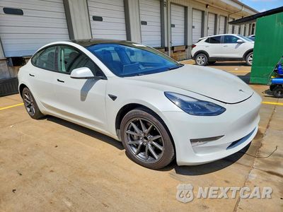 Czwarte zdjęcie samochodu z boku: 2023 TESLA MODEL 3 VIN:5YJ3E1EA7PF437219 - miniatura