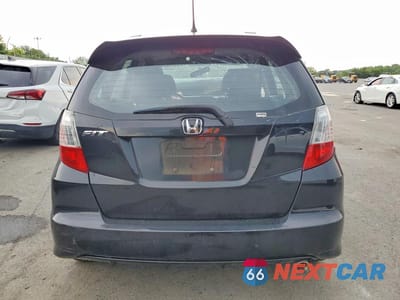 Zdjęcie 6 z 13 samochodu: 2011 HONDA FIT SPORT VIN:JHMGE8H59BC002084 - miniatura